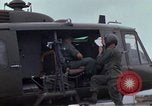 Image of Gen William C Westmoreland in conversation and departure in helicopter A Shau Valley Vietnam, 1968, second 48 stock footage video 65675026863