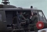 Image of Gen William C Westmoreland in conversation and departure in helicopter A Shau Valley Vietnam, 1968, second 49 stock footage video 65675026863