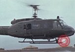 Image of Gen William C Westmoreland in conversation and departure in helicopter A Shau Valley Vietnam, 1968, second 52 stock footage video 65675026863