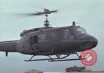 Image of Gen William C Westmoreland in conversation and departure in helicopter A Shau Valley Vietnam, 1968, second 53 stock footage video 65675026863