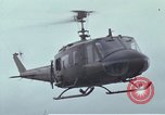 Image of Gen William C Westmoreland in conversation and departure in helicopter A Shau Valley Vietnam, 1968, second 55 stock footage video 65675026863