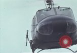 Image of Gen William C Westmoreland in conversation and departure in helicopter A Shau Valley Vietnam, 1968, second 57 stock footage video 65675026863