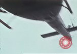 Image of Gen William C Westmoreland in conversation and departure in helicopter A Shau Valley Vietnam, 1968, second 58 stock footage video 65675026863