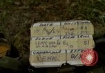 Image of Soldiers walking through the fields during Operation Delaware A Shau Valley Vietnam, 1968, second 4 stock footage video 65675026864