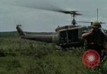 Image of Soldiers walking through the fields during Operation Delaware A Shau Valley Vietnam, 1968, second 9 stock footage video 65675026864