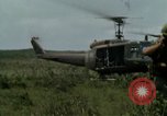 Image of Soldiers walking through the fields during Operation Delaware A Shau Valley Vietnam, 1968, second 10 stock footage video 65675026864