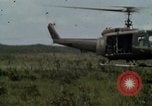 Image of Soldiers walking through the fields during Operation Delaware A Shau Valley Vietnam, 1968, second 12 stock footage video 65675026864
