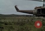 Image of Soldiers walking through the fields during Operation Delaware A Shau Valley Vietnam, 1968, second 13 stock footage video 65675026864