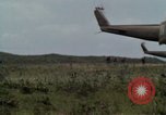 Image of Soldiers walking through the fields during Operation Delaware A Shau Valley Vietnam, 1968, second 14 stock footage video 65675026864