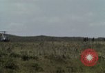 Image of Soldiers walking through the fields during Operation Delaware A Shau Valley Vietnam, 1968, second 16 stock footage video 65675026864