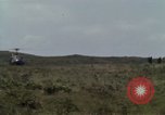 Image of Soldiers walking through the fields during Operation Delaware A Shau Valley Vietnam, 1968, second 17 stock footage video 65675026864