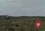 Image of Soldiers walking through the fields during Operation Delaware A Shau Valley Vietnam, 1968, second 18 stock footage video 65675026864
