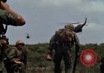 Image of Soldiers walking through the fields during Operation Delaware A Shau Valley Vietnam, 1968, second 19 stock footage video 65675026864