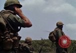 Image of Soldiers walking through the fields during Operation Delaware A Shau Valley Vietnam, 1968, second 23 stock footage video 65675026864