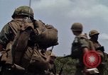 Image of Soldiers walking through the fields during Operation Delaware A Shau Valley Vietnam, 1968, second 25 stock footage video 65675026864