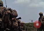 Image of Soldiers walking through the fields during Operation Delaware A Shau Valley Vietnam, 1968, second 26 stock footage video 65675026864