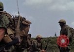 Image of Soldiers walking through the fields during Operation Delaware A Shau Valley Vietnam, 1968, second 27 stock footage video 65675026864