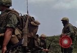 Image of Soldiers walking through the fields during Operation Delaware A Shau Valley Vietnam, 1968, second 29 stock footage video 65675026864