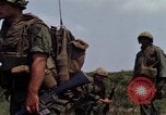 Image of Soldiers walking through the fields during Operation Delaware A Shau Valley Vietnam, 1968, second 32 stock footage video 65675026864