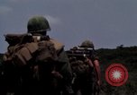Image of Soldiers walking through the fields during Operation Delaware A Shau Valley Vietnam, 1968, second 43 stock footage video 65675026864