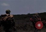 Image of Soldiers walking through the fields during Operation Delaware A Shau Valley Vietnam, 1968, second 45 stock footage video 65675026864