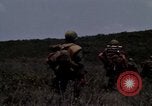 Image of Soldiers walking through the fields during Operation Delaware A Shau Valley Vietnam, 1968, second 47 stock footage video 65675026864