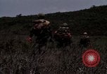 Image of Soldiers walking through the fields during Operation Delaware A Shau Valley Vietnam, 1968, second 49 stock footage video 65675026864