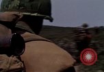Image of Soldiers walking through the fields during Operation Delaware A Shau Valley Vietnam, 1968, second 58 stock footage video 65675026864