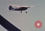 Image of Forward Air Controller coordinating US jets bombing target Vietnam, 1966, second 14 stock footage video 65675026867