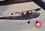 Image of Forward Air Controller coordinating US jets bombing target Vietnam, 1966, second 34 stock footage video 65675026867