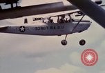 Image of Forward Air Controller coordinating US jets bombing target Vietnam, 1966, second 35 stock footage video 65675026867