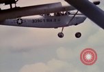 Image of Forward Air Controller coordinating US jets bombing target Vietnam, 1966, second 36 stock footage video 65675026867