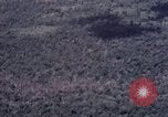 Image of Forward Air Controller coordinating US jets bombing target Vietnam, 1966, second 41 stock footage video 65675026867