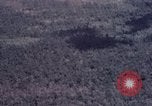 Image of Forward Air Controller coordinating US jets bombing target Vietnam, 1966, second 42 stock footage video 65675026867