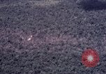 Image of Forward Air Controller coordinating US jets bombing target Vietnam, 1966, second 44 stock footage video 65675026867
