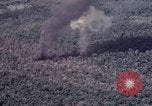 Image of Forward Air Controller coordinating US jets bombing target Vietnam, 1966, second 52 stock footage video 65675026867