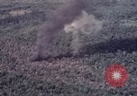 Image of Forward Air Controller coordinating US jets bombing target Vietnam, 1966, second 53 stock footage video 65675026867