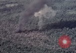 Image of Forward Air Controller coordinating US jets bombing target Vietnam, 1966, second 54 stock footage video 65675026867