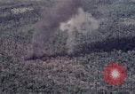 Image of Forward Air Controller coordinating US jets bombing target Vietnam, 1966, second 55 stock footage video 65675026867