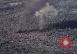 Image of Forward Air Controller coordinating US jets bombing target Vietnam, 1966, second 56 stock footage video 65675026867