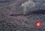 Image of Forward Air Controller coordinating US jets bombing target Vietnam, 1966, second 57 stock footage video 65675026867