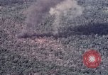 Image of Forward Air Controller coordinating US jets bombing target Vietnam, 1966, second 58 stock footage video 65675026867