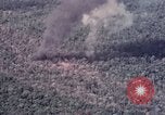 Image of Forward Air Controller coordinating US jets bombing target Vietnam, 1966, second 59 stock footage video 65675026867