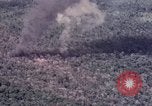 Image of Forward Air Controller coordinating US jets bombing target Vietnam, 1966, second 60 stock footage video 65675026867