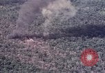 Image of Forward Air Controller coordinating US jets bombing target Vietnam, 1966, second 62 stock footage video 65675026867