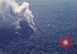 Image of Explosion in the forest area during Operation Attleboro Dau Tieng Vietnam, 1966, second 10 stock footage video 65675026871