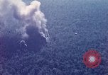 Image of Explosion in the forest area during Operation Attleboro Dau Tieng Vietnam, 1966, second 11 stock footage video 65675026871