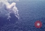 Image of Explosion in the forest area during Operation Attleboro Dau Tieng Vietnam, 1966, second 12 stock footage video 65675026871