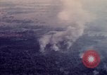 Image of Explosion in the forest area during Operation Attleboro Dau Tieng Vietnam, 1966, second 62 stock footage video 65675026871