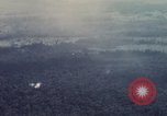Image of Dropping of bombs by F-100 plane during Operation Attleboro Dau Tieng Vietnam, 1966, second 4 stock footage video 65675026872